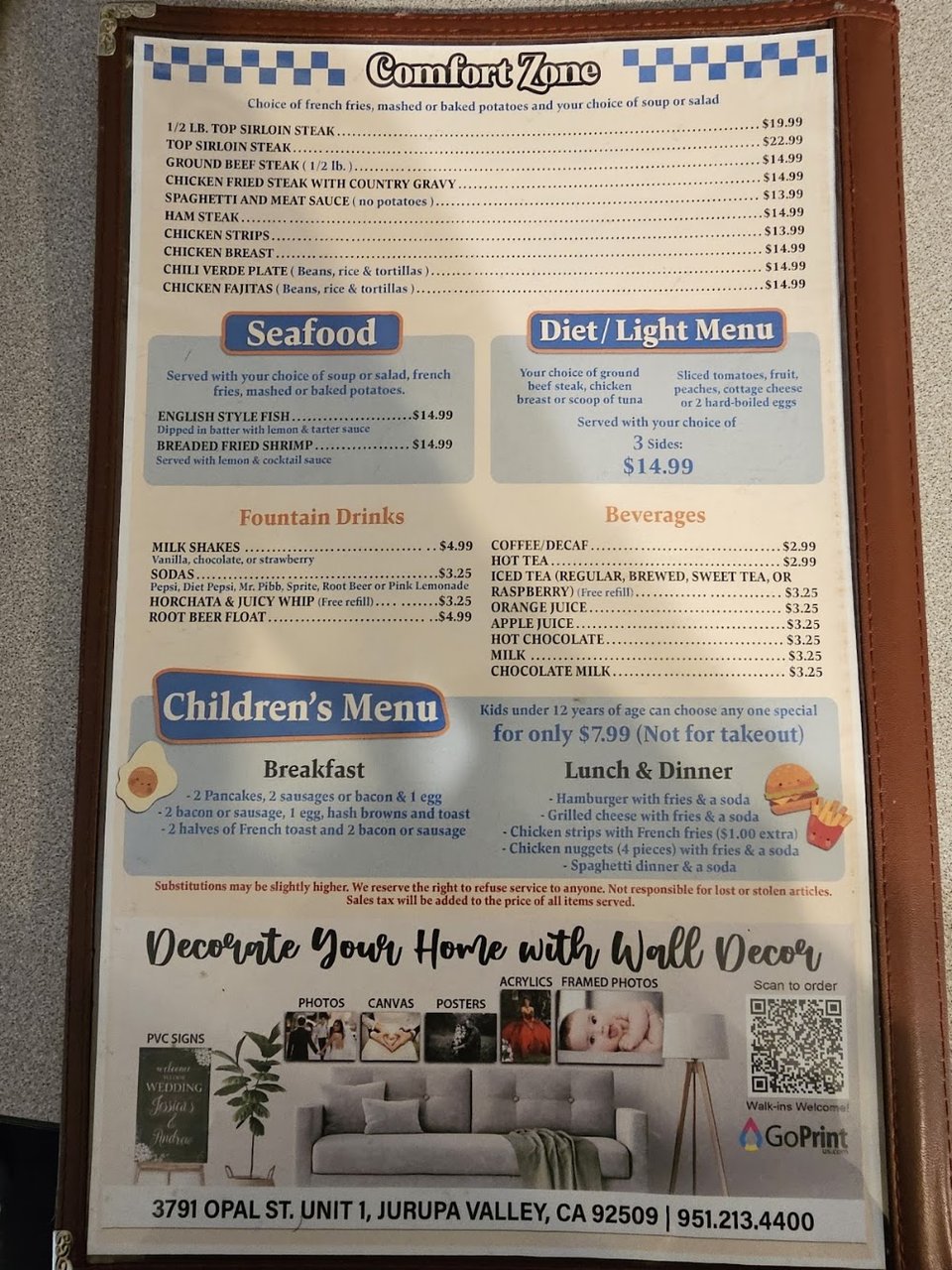 Printed menu with burgers, steaks, and breakfast plates.
